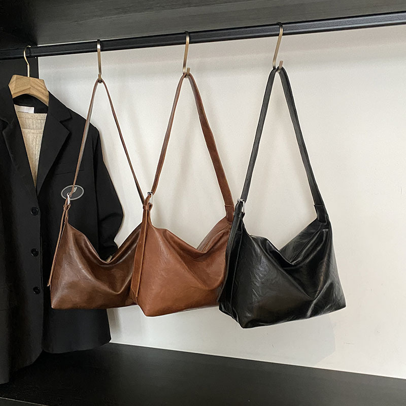 Bolso de gran capacidad relajado retro primavera 2025 nueva moda mochila de hombro textural bolso de dumpling damas