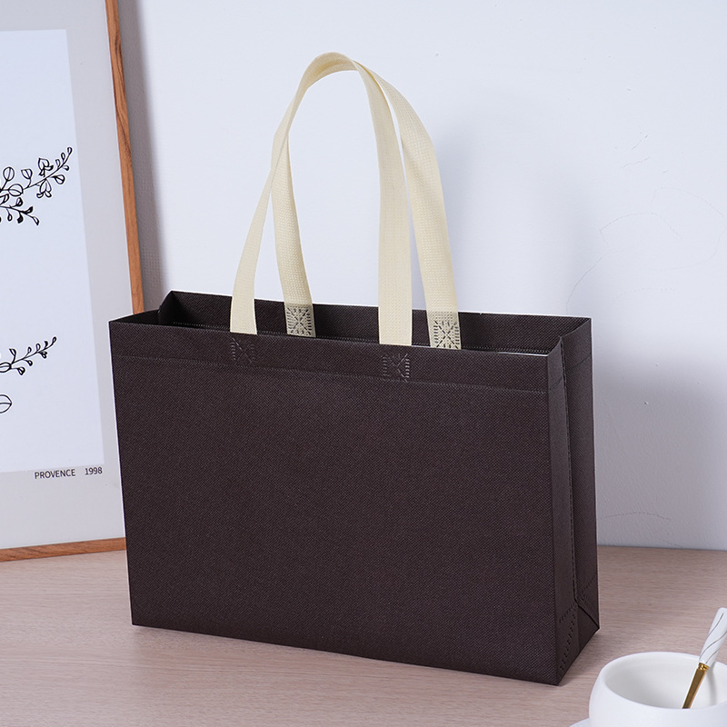 Bolsas de tela no tejida personalizadas logotipo bolsas de compras portátiles bolsas de ropa al por mayor de alta calidad tiendas de ropa de mujer bolsas personalizadas
