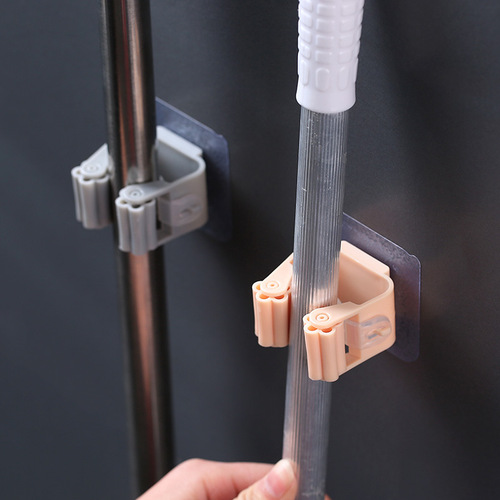 Household broom and mop hanger, bathroom wall punch-free mop clip, creative multi-functional storage rack
