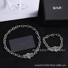 普家/P家经典倒三角高版本新款个性潮流款滴胶一体链两件套首饰