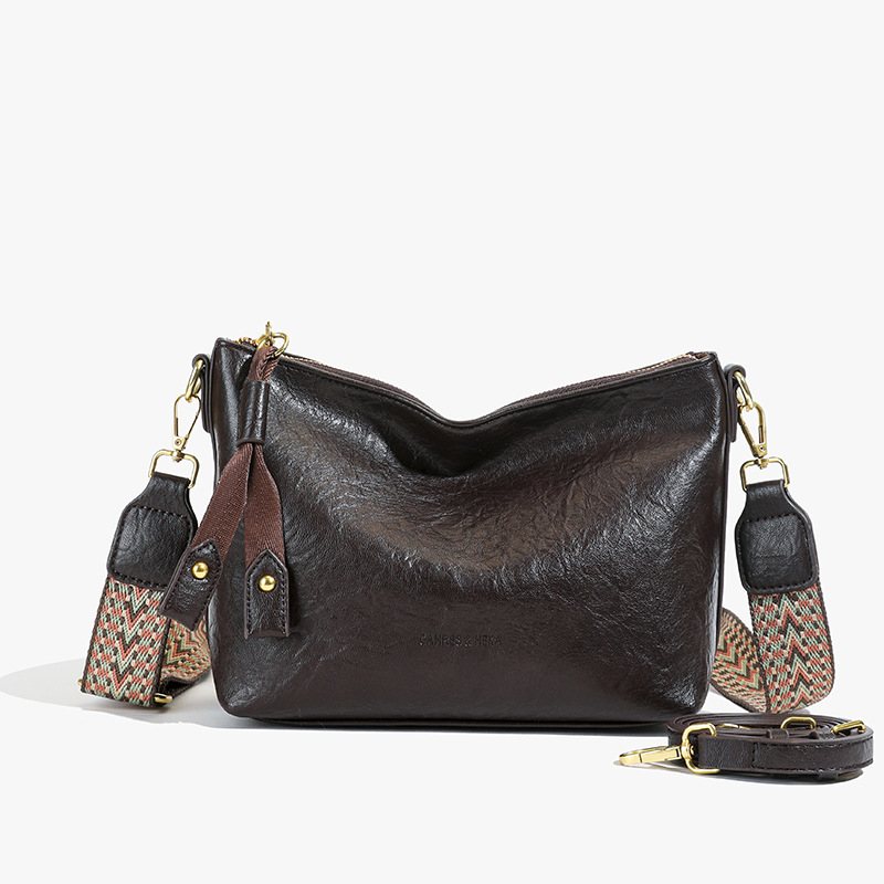 Bolsa de alta sensación de comercio exterior para mujeres 2025 nueva moda simple bolso de hombro de viaje casual bolso de cubo de agua