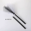 Black and white sequined broom