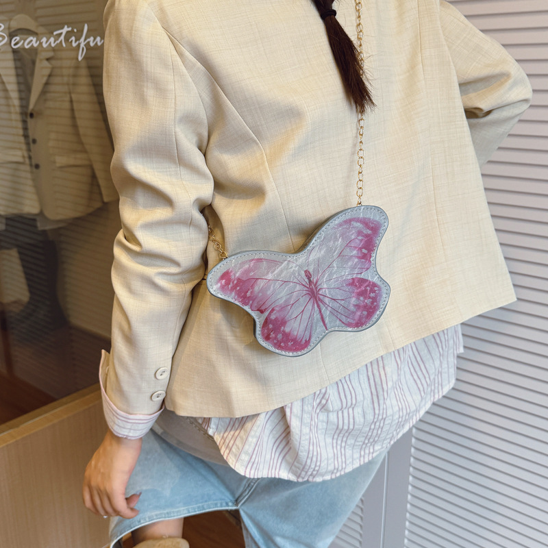 Dolce y lindo pequeña mariposa niña bolsa de hombro exquisita mini bolsa de cadena de bebé bolsa de cambio de comercio exterior transfronterizo para niños