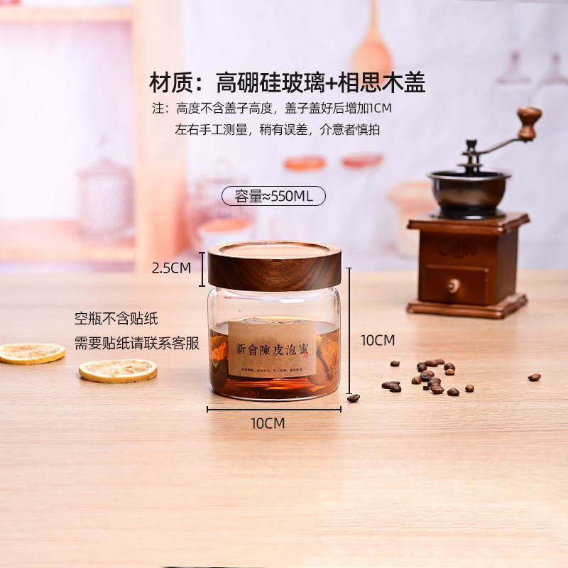 蜂蜜を入れて瓶を分けて専用の食品級の高ホウ素シリコンを詰めて缶を密封します。|undefined
