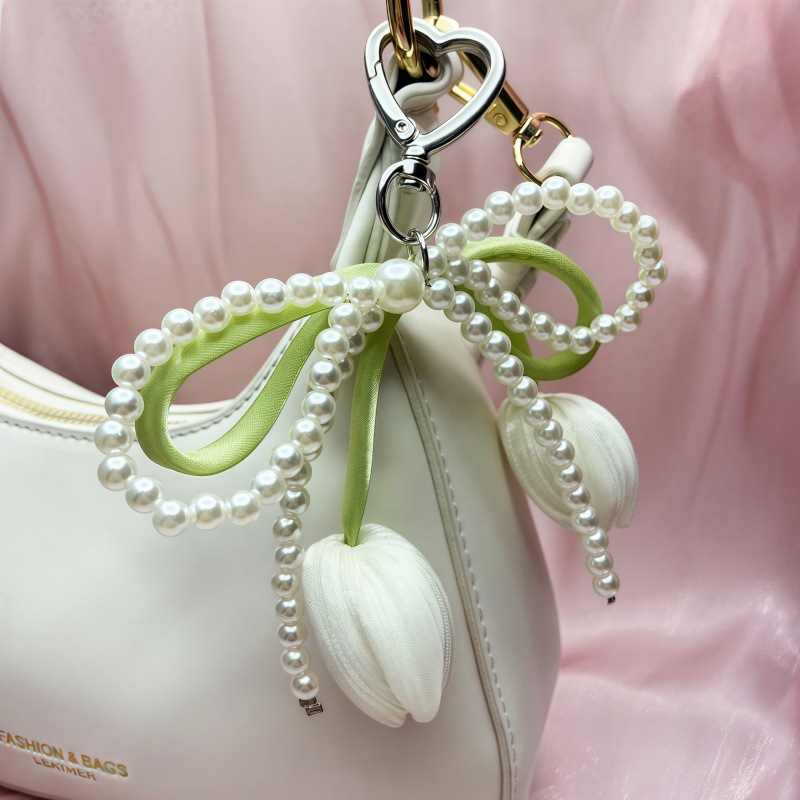 Venta caliente transfronteriza colgante de tulipán colgante de lazo llavero decoración de bolsos de mujer accesorios perlas al por mayor