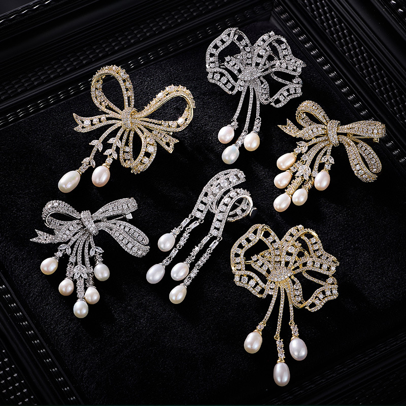 Autumn and Winter New Bow Brooch High-End High-End Freshwater Pearl Tassel Pendant Corsage Sweater Coat Jewelry