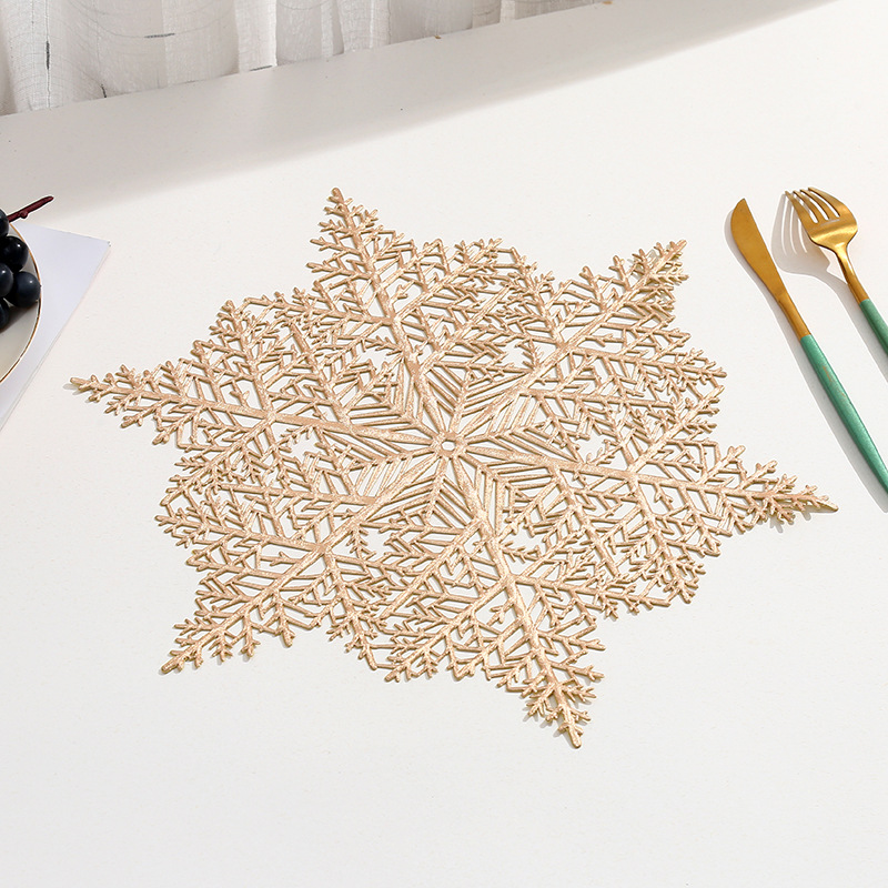 Copo de nieve de Navidad transfronterizo mantel de pvc decoración de restaurante de Navidad restaurante occidental bronceado tapete de mesa hueca al por mayor