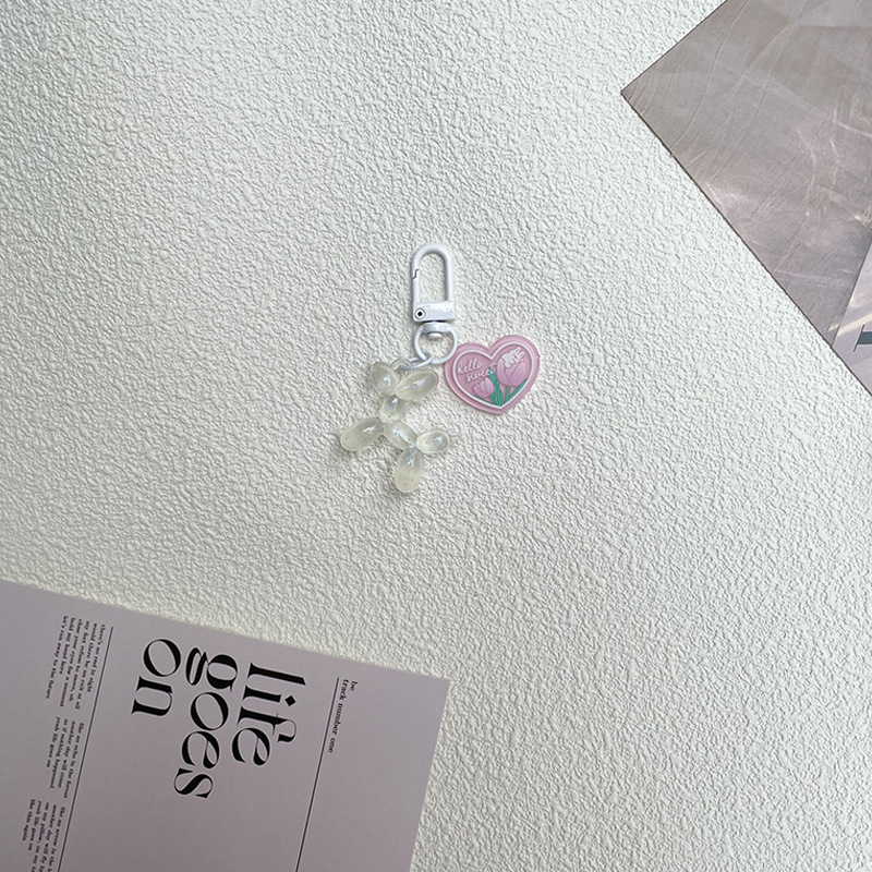 Pequeño Libro Rojo mismo lindo jalea globo láser perro llavero colgante colorido cachorro de dibujos animados teléfono llavero