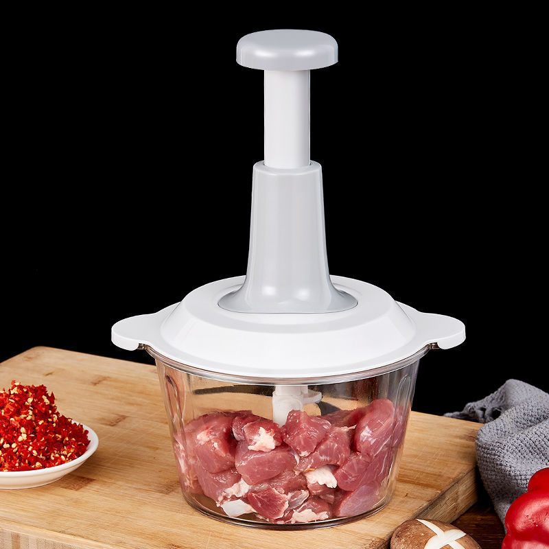 工場の卸売り代行の大量の現物はニンニクの泥の料理器を押して肉を絞る機の家庭用の手動の補助食機をたたきます。|undefined