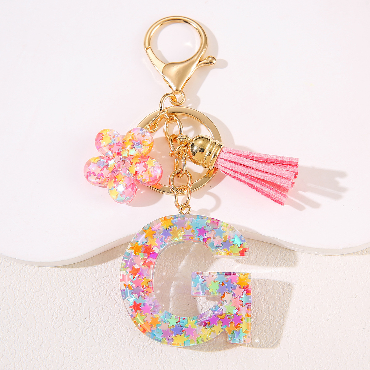 Un nuevo llavero flor de goteo de goma esquinilla 26 letras bolsos colgante llavero accesorios Yiwu