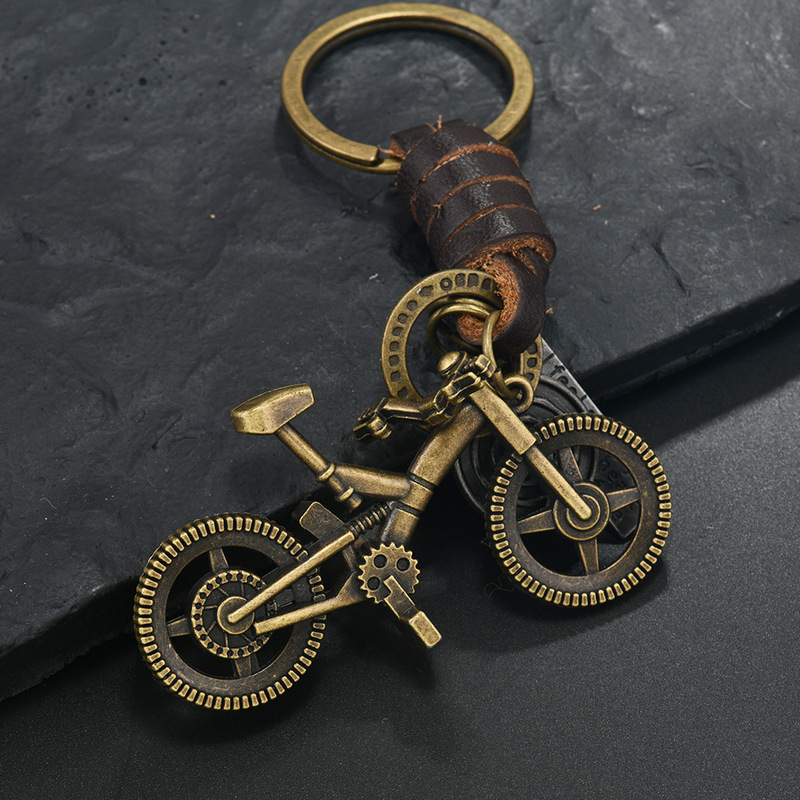Cross-Border Bicycle Keychain Men's and Women's Gifts Alloy Bronze Smiling Face Six-Pointed Star Retro Woven Cowhide Keychain