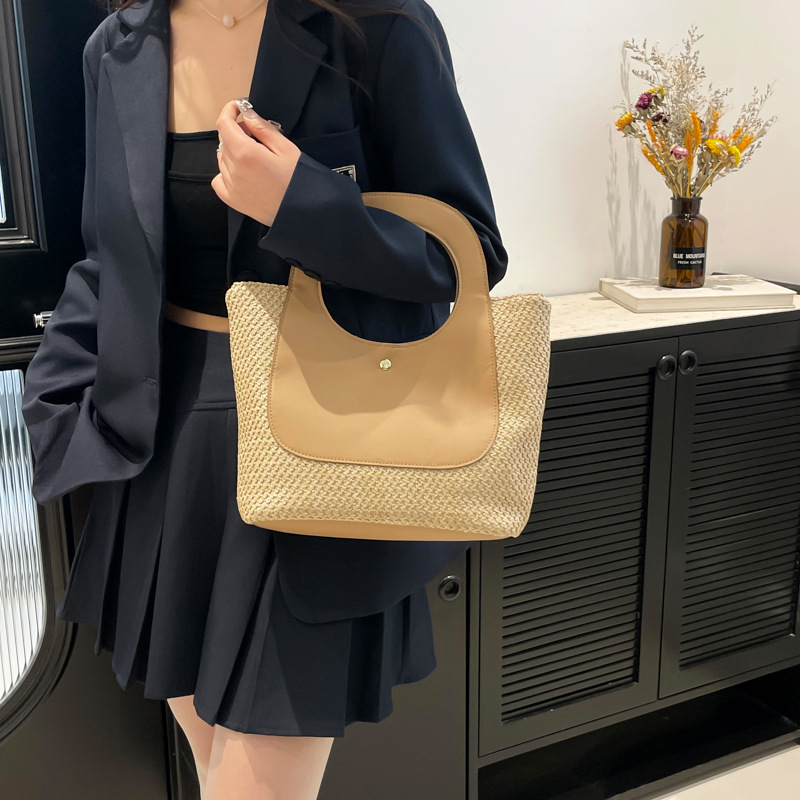 Bolsa de paja de empalme retro 2026 nueva bolsa de moda femenina minimalista de gran capacidad bolsa de tejido de arte de marea