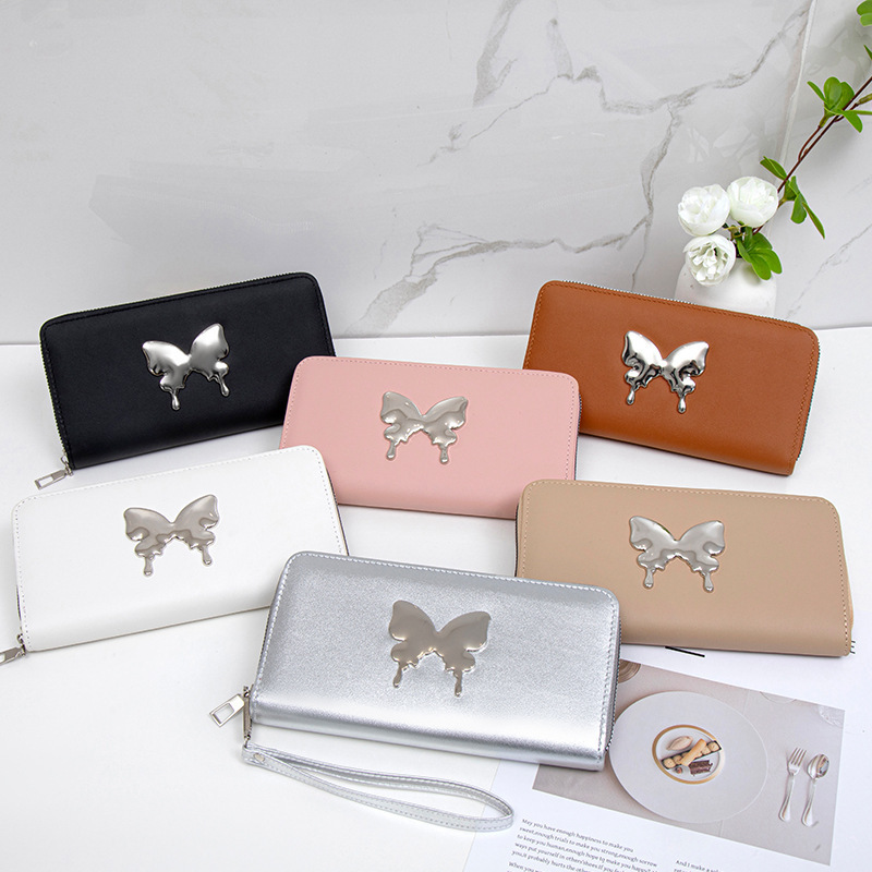 Nicho coreano 2024 mariposa metálica decoración PU material compacto exquisito lindo bolso de mano de mujer