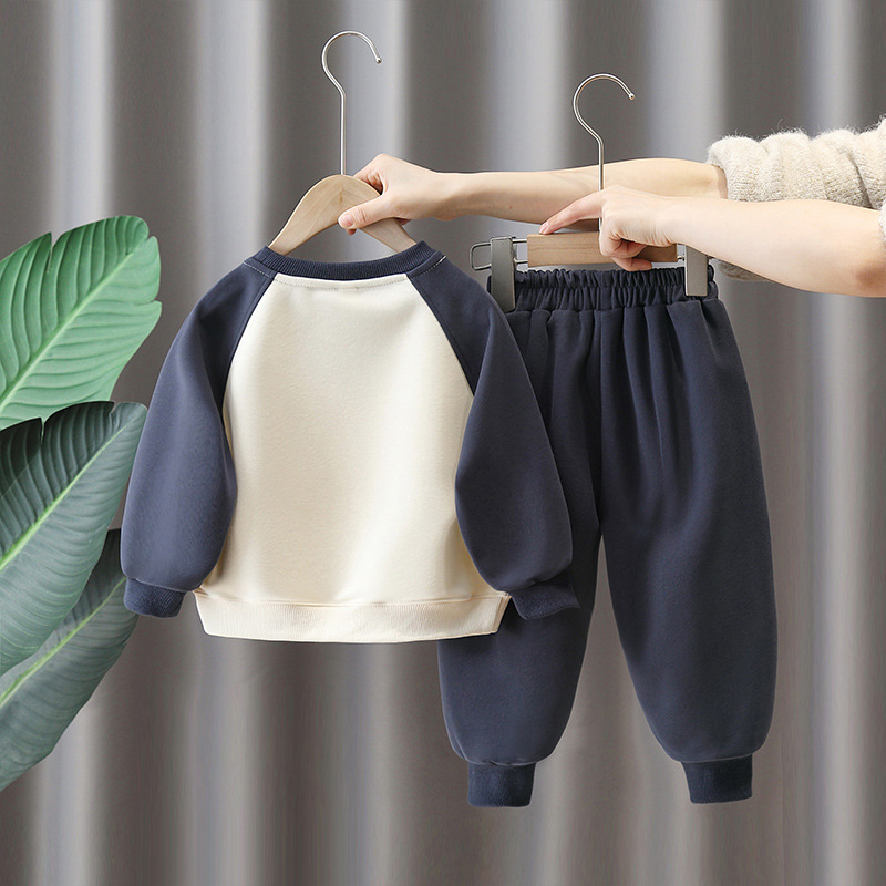 6161 traje de suéter para niños primavera y otoño 2025 nueva ropa de dibujos animados para niños bebé otoño neto de dos piezas