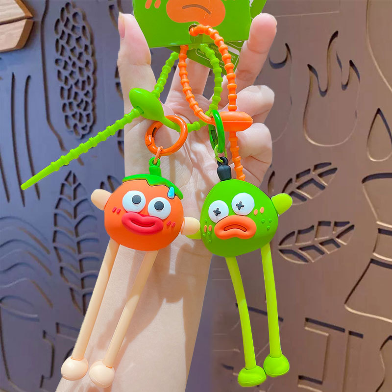 Cartoon stretch ugly fruit gentleman keychain creative pull decompression doll couple car bag pendant gift Cartoon stretch ugly fruit gentleman keychain creative pull decompression doll couple car bag pendant gift