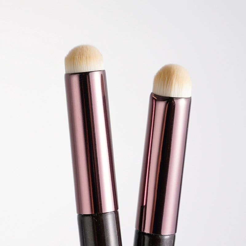 Lipstick, handheld concealer brush, lip care