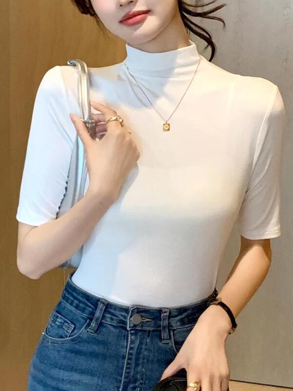 秋冬の小さい立襟の半袖のtシャツの女性の早秋の新型の韓国版は半高襟の5分の袖の純色の上着を身につけます。|undefined