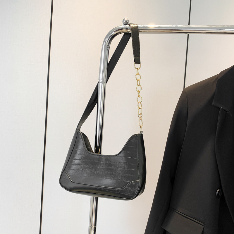 Bolsos debajo de las axilas para mujeres 2024 nueva moda de cadena de nicho de diseño de alta sensación de anguila mochila de hombro