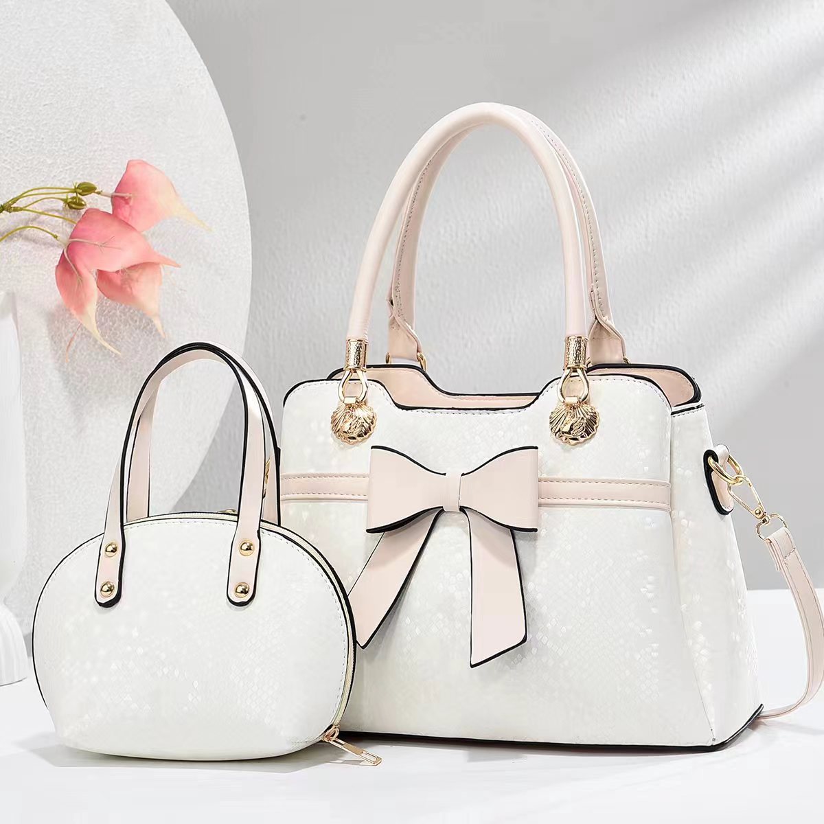 Bolso bolso bowknot bolso de madre e hijo patrón de serpiente bolso de mujer de comercio exterior textura bolso de mensajero de un solo hombro bags al por mayor transfronterizos