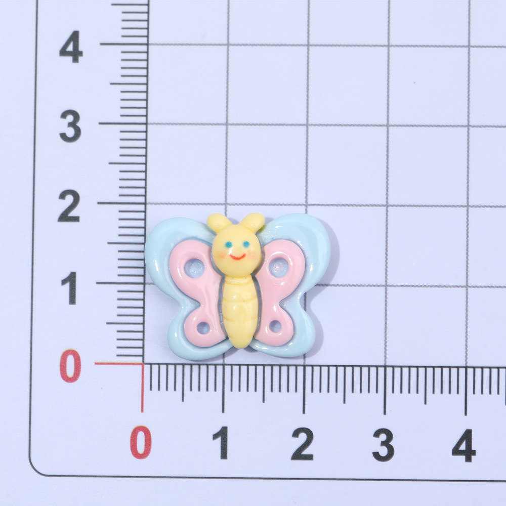 Macaron color pastoral abeja mariposa resina accesorios DIY crema pegamento accesorios para el cabello teléfono móvil Shell accesorios hechos a mano al por mayor