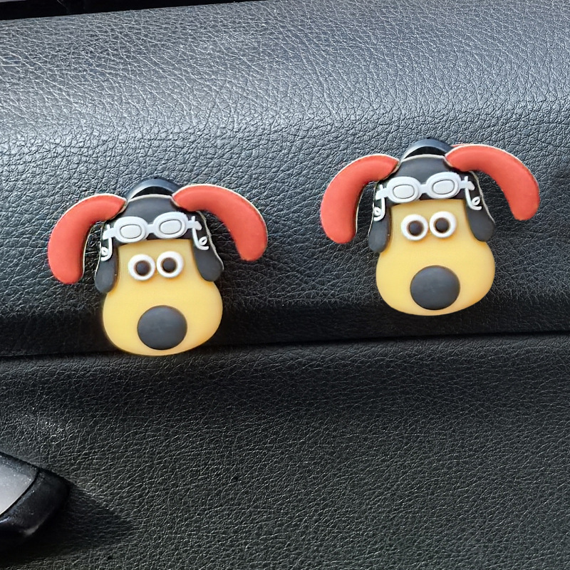 La cabeza de la celebridad de Internet, la batería del coche, el gancho del coche, el gancho pequeño del coche del copiloto delantero, los accesorios del coche