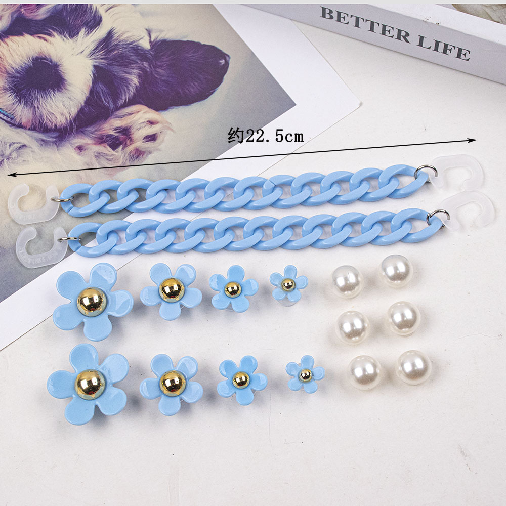 Resina artificial Flor de Oro núcleo de cinco pétalos accesorios de flores DIY agujero zapatos zapato hebilla joyería hebilla Margarita perla conjunto