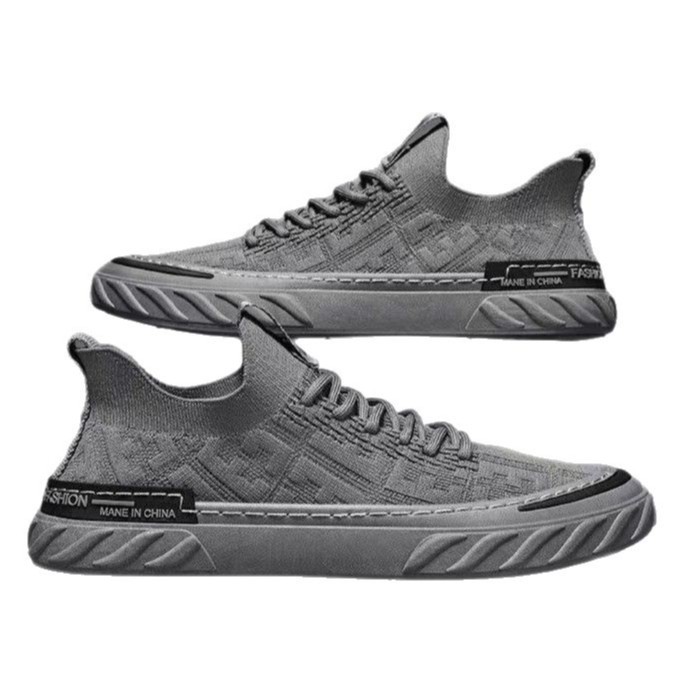 Nuevos zapatos de hombre de tela volante, zapatos de un solo pedazo de malla transpirables coreanos simples y cómodos zapatos de hombre al por mayor