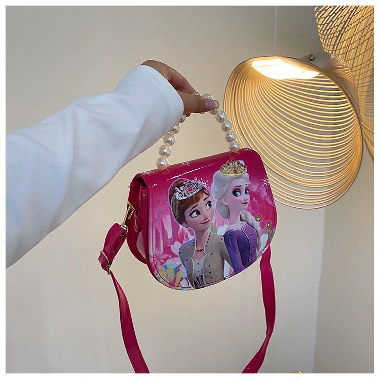 2024 nueva bolsa de hombro para niños princesa Elsa dibujos animados Yue Gui perro coreano nicho perla bolsa de mano inclinada