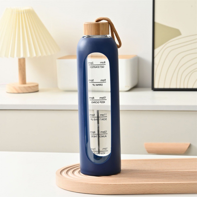 Taza de vidrio con tapa de bambú de gran capacidad transfronteriza, cuerda de elevación, cubierta de silicona portátil, taza de agua graduada, botella de agua deportiva de vidrio de alto valor
