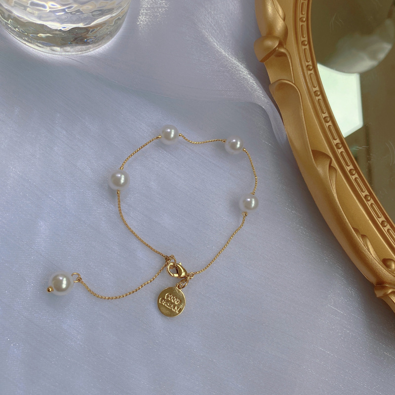 retro metal imitation pearl person head round brand bracelet necklace elegant braceletpicture3