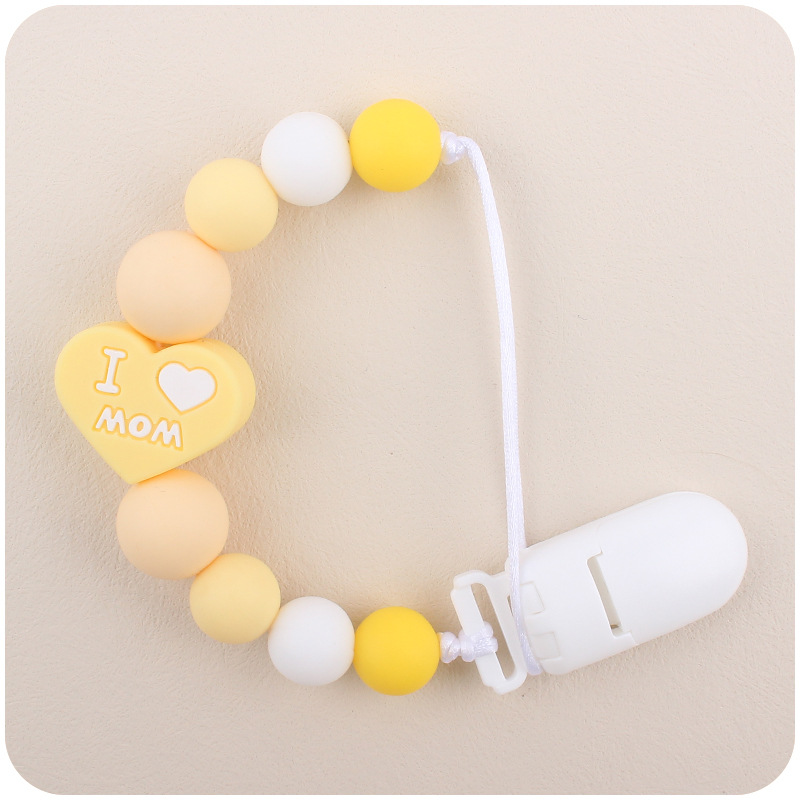 Bebé de dibujos animados amor dos lados mamá papá silicona mordedor calmante bebé chupete cadena a prueba de mordedura