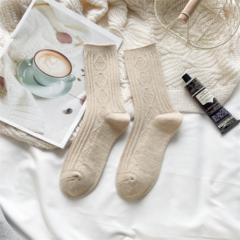 ウールの靴下の子供の秋冬の保温は厚いです。