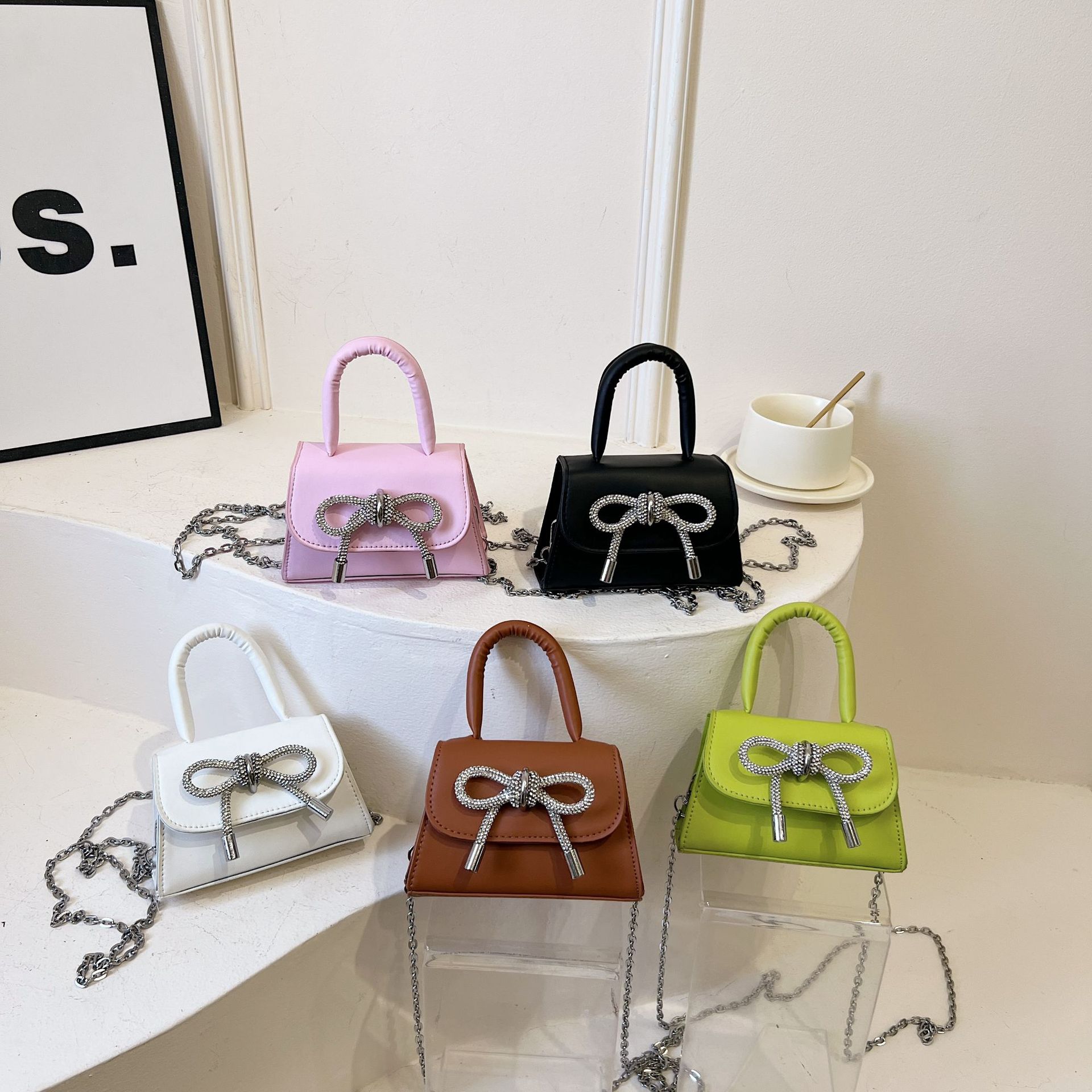 Ins niche French textured bag female 2024 new bow small square bag stylish shoulder messenger bag_voghion.com