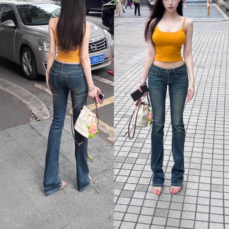 Korean style design feeling retro distressed micro-lar jeans women's autumn new low waist slimming slim-fit floor-mopping trousers trendy