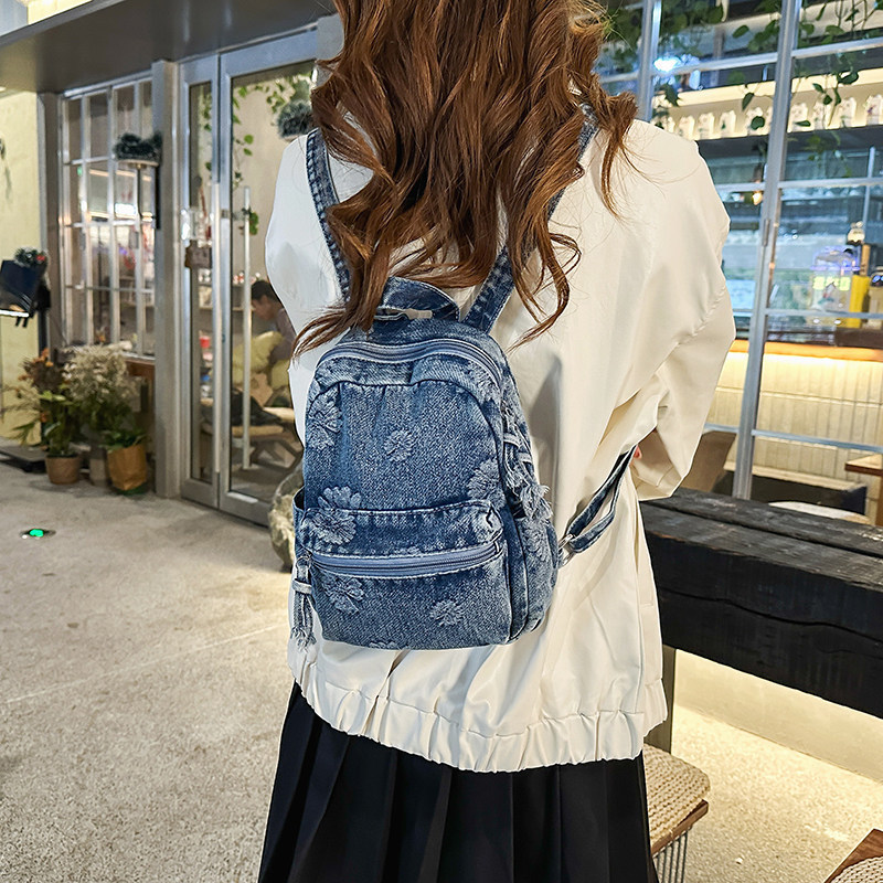 Mochila de denim japonesa retro 2026 nueva moda de mochila de viaje universal diaria