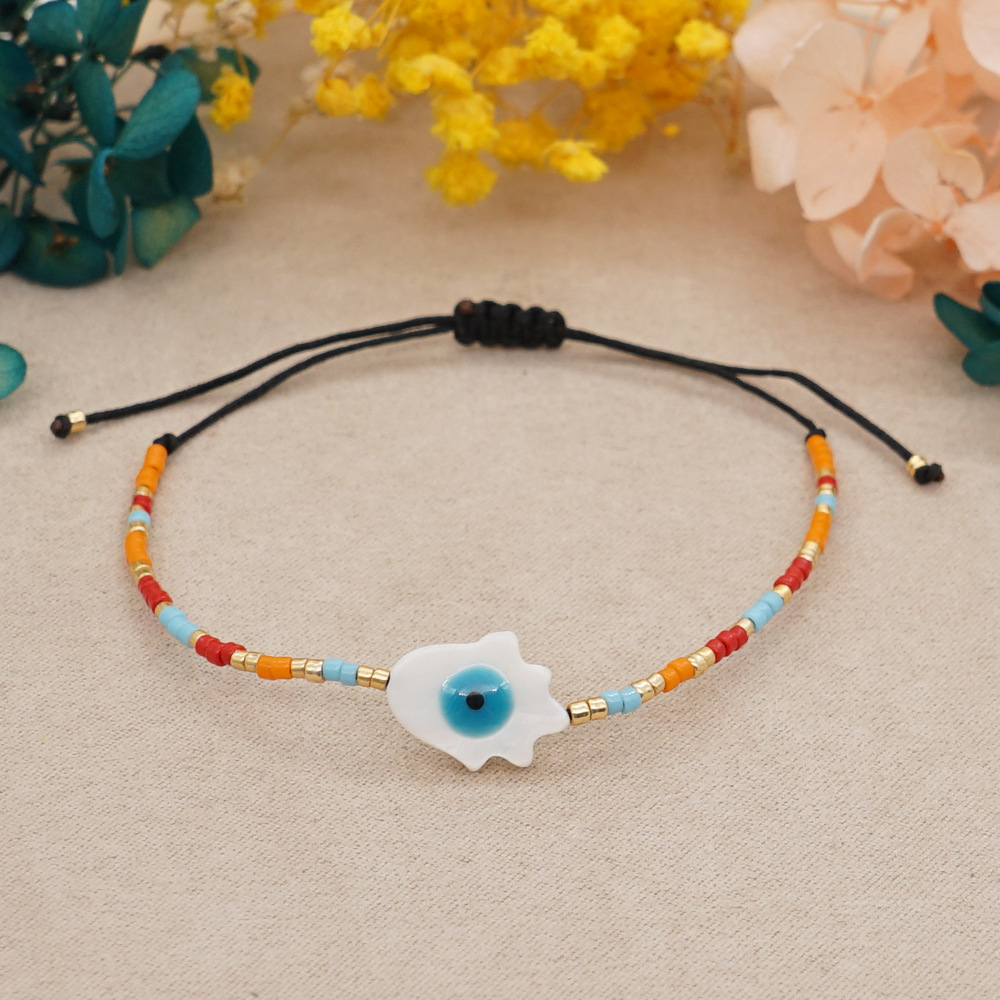Simple natural shell lucky eyes rice beads hand-woven colorful beaded bracelet