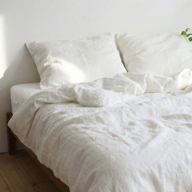 Juego de cuatro piezas de lino puro lavado a la francesa, estilo INS de lujo ligero, ropa de cama de color liso para otoño e invierno, ideal para dormir sin ropa, venta al por mayor para otoño e invierno.