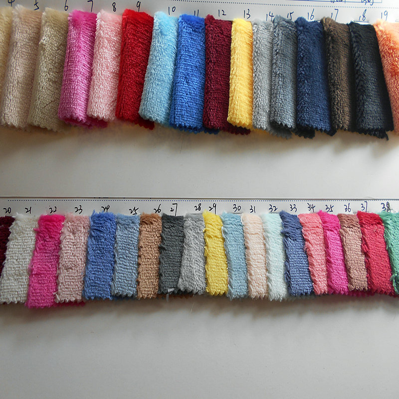 现货经编单面法兰绒法莱绒荧光 全涤加厚素色法兰绒秋冬服装面料1