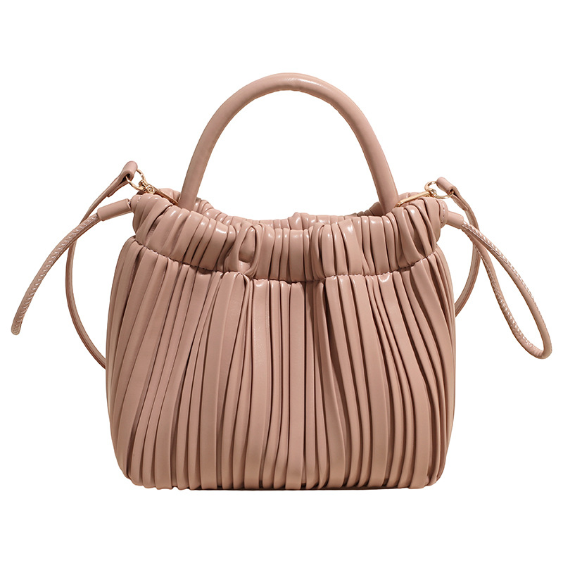 2025 otoño y invierno nuevo bolso plegable bolso de cubo de cuerda de tracción universal bolso de hombro de moda de mujer bolso de viaje