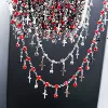 Red three prong diamond cross chain