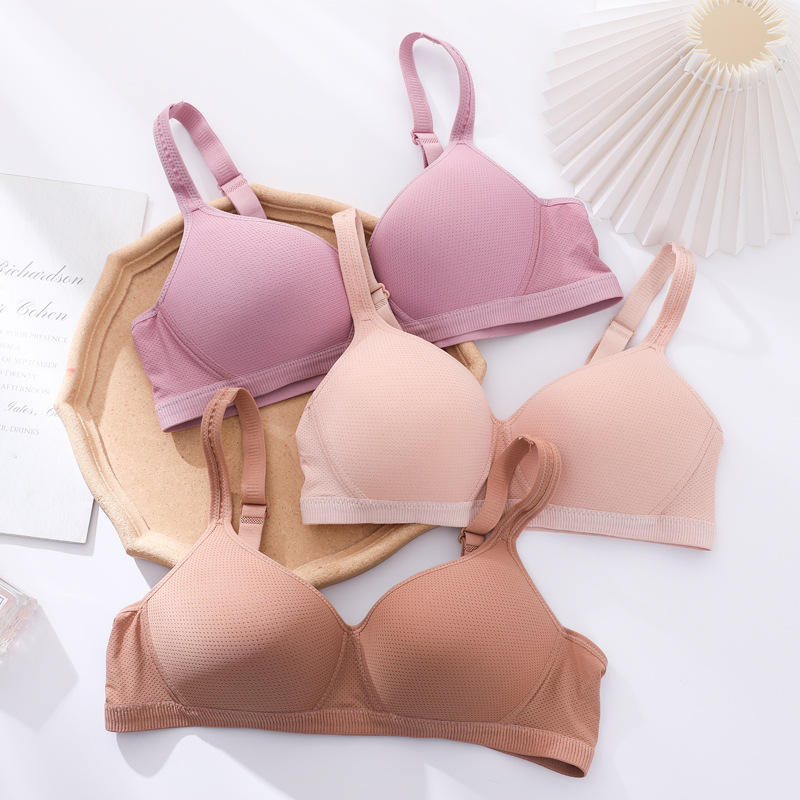 Fábrica de stock sin anillo de acero ligero delgado y transpirable sin ropa interior esponja, gran pecho pequeño sujetador anti-caída