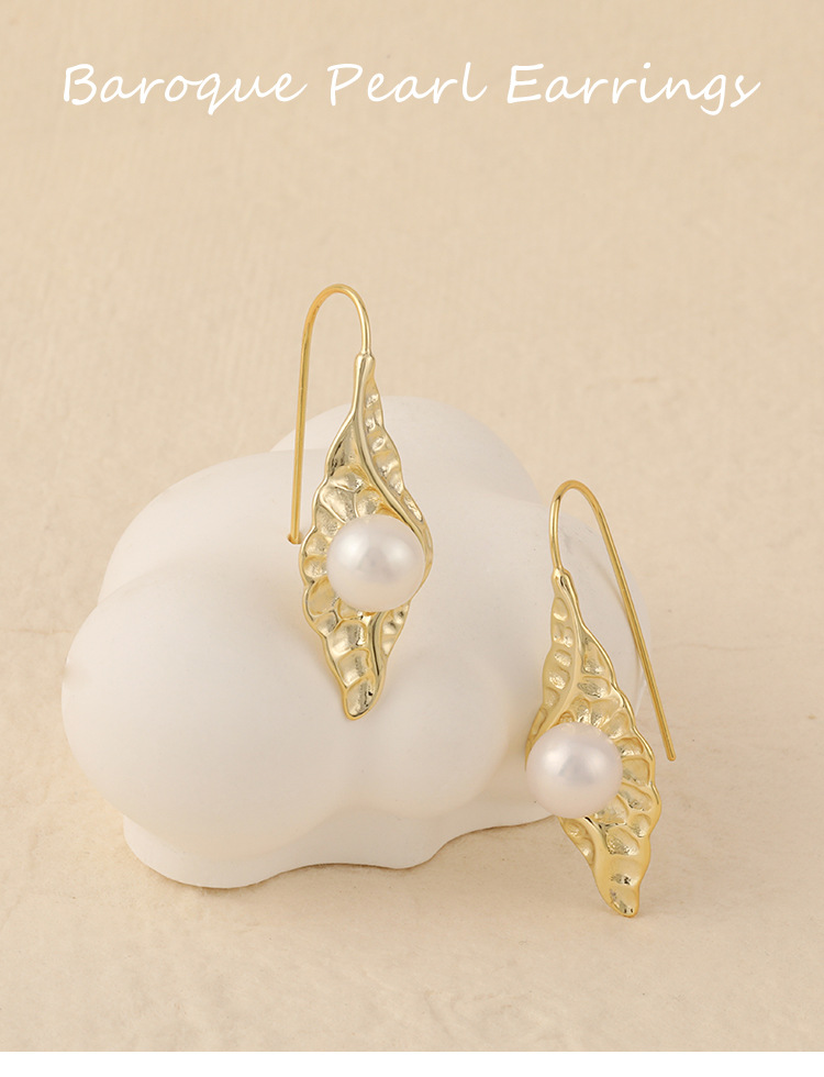 E572 Korean Style S925 Silver Pearl Earrings Women's Irregular Concave And Convex Pleated Leaf-shaped Earring Fashionable Earrings display picture 1