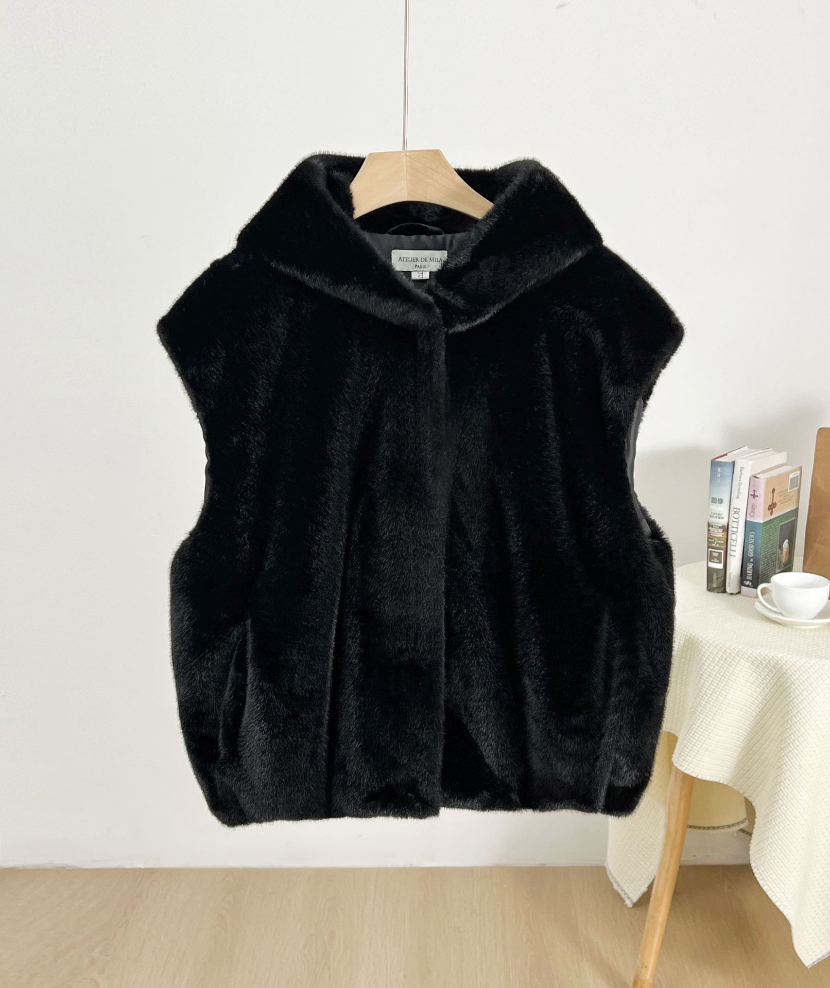 Primavera nuevo chaleco con capuzas de imitación de chaleco de botón una chaqueta de moda al por mayor corta