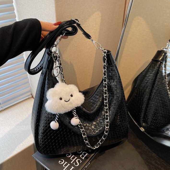 Bolso de axila para mujer 2025 nuevo bolso de hombro de moda de nicho de tejido popular bolso de mensajero de estilo occidental simple de gran capacidad