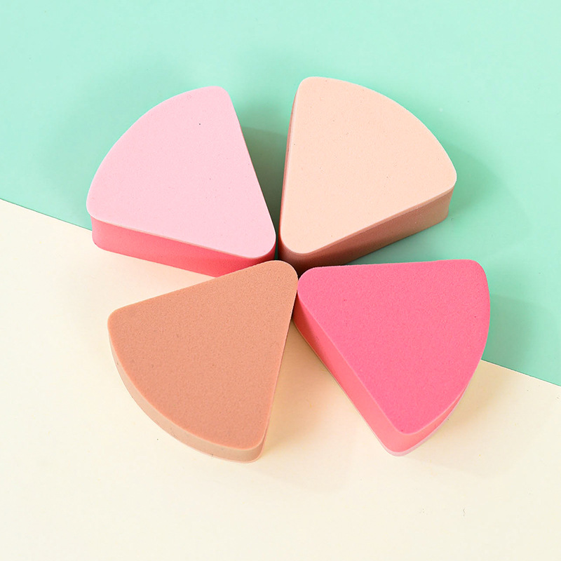 Fábrica personalizada de polvo de esponja triangular no comer polvo seco y húmedo de doble uso en agua de remojo para aumentar el maquillaje no látex de gel de goma cosmética