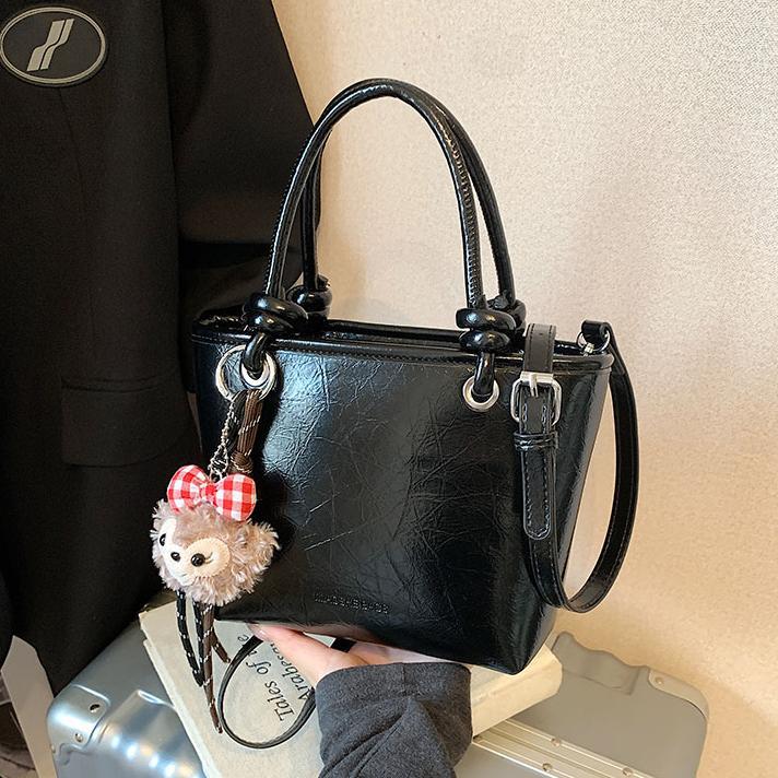 Bolso popular de este año para mujeres 2024 nueva moda versátil bolso de cubo de moda extranjera bolso de hombro portátil