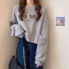 ゆったりとした腰がやせている丸首のカバーのショートタイプのカーディガンの女性は秋冬の上着の小さい子供と春の薄いタイプを厚くします。