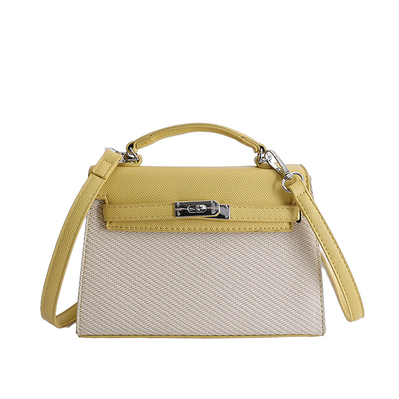Textura de nicho bolso de diseño de mujer 2026 nuevo bolso Kylie color contraste diario simple viaje mochila de hombro