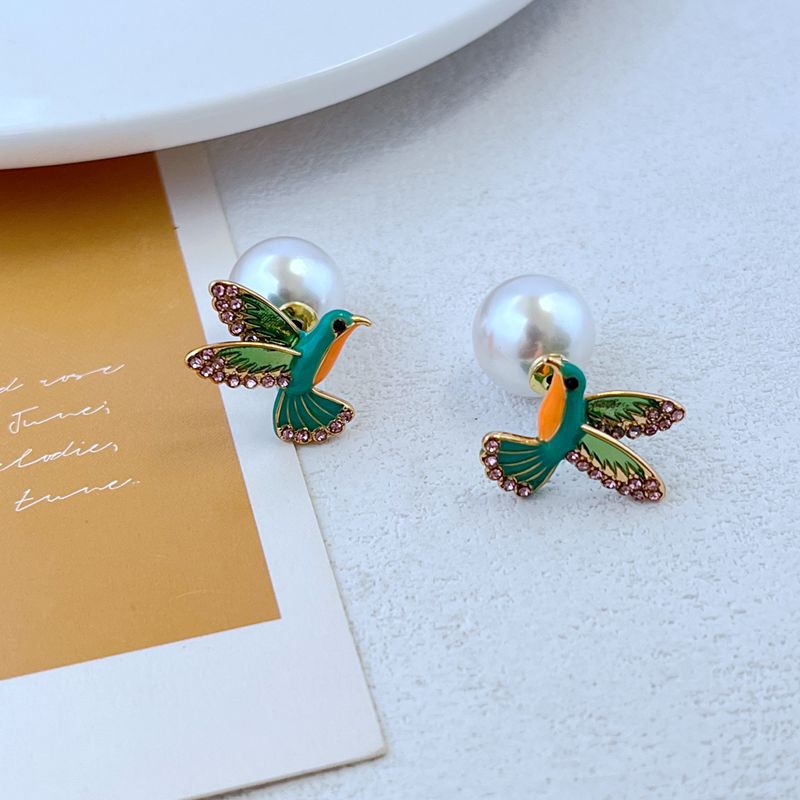 Elegant Cute Bird Imitation Pearl Copper Plating Zircon Women's Ear Studs 1 Pair display picture 1