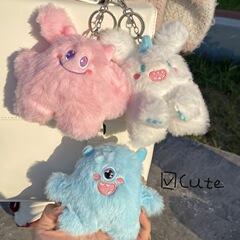 かわいい赤ちゃんのほほえみのウサギの小さい怪獣の公仔の少女の心のカバンのキーホルダーのペンダントのぬいぐるみの卸売り